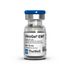 Close-up of a glass vial with a blue cap, labeled VitroGel EMT, a ready-to-use synthetic hydrogel for spheroid culture from TheWell Bioscience.